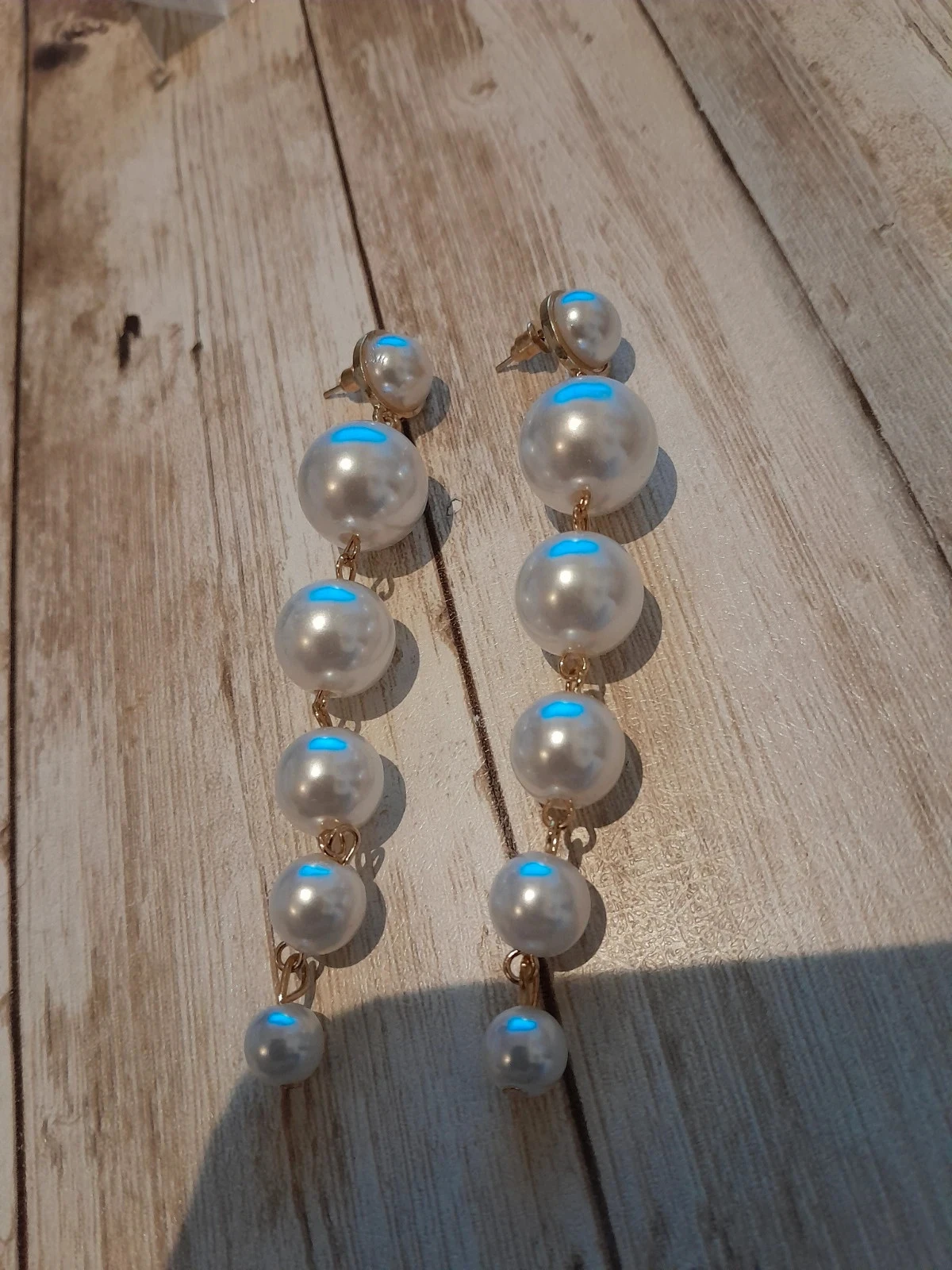 Boucles d'oreilles pendantes perles, dorées